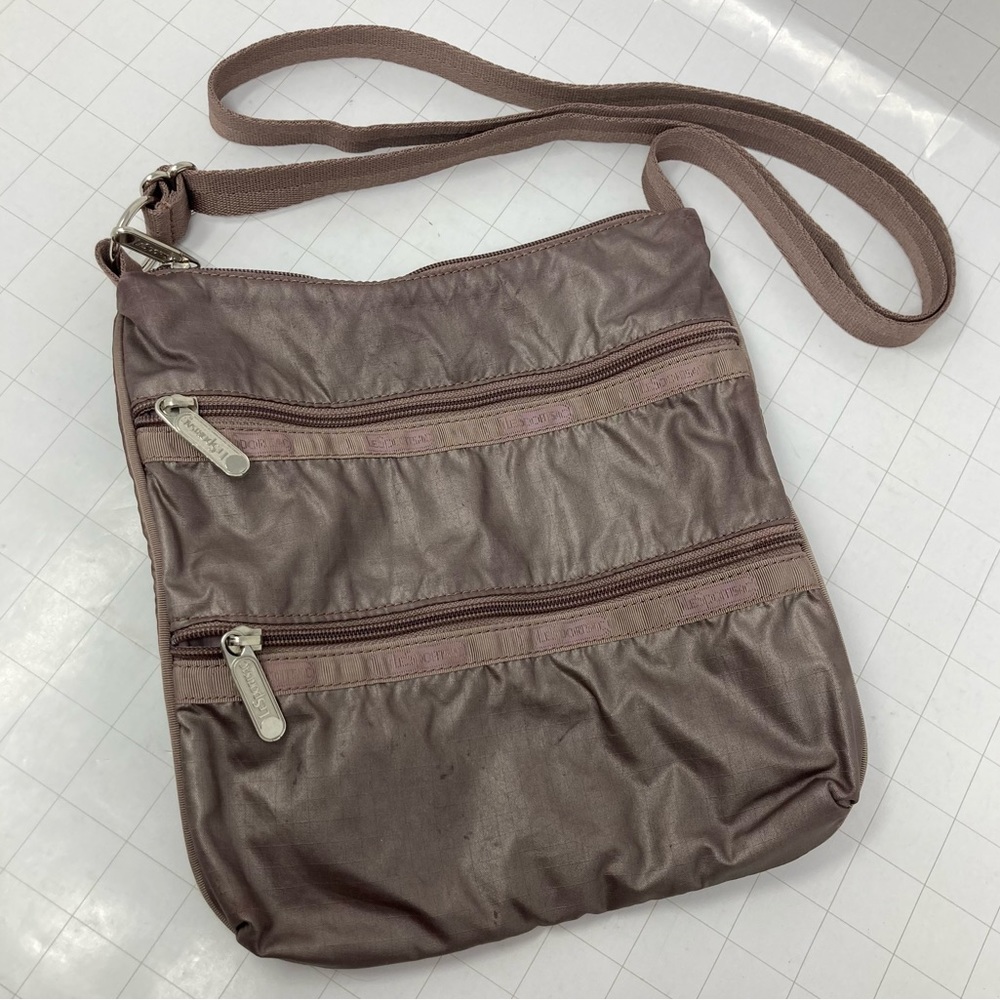 LeSportsac 3 zip adjustable cross body rose / mauvey purple color silver zips